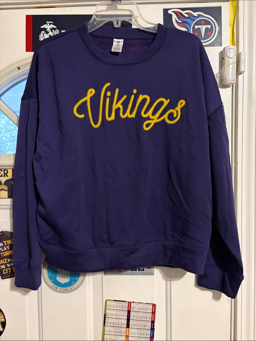 Purple Crewneck Sweatshirt with Yellow Minnesota Vikings logo. NWOT